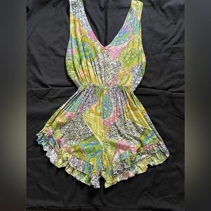 patchwork romper, size xs, with a open back and is super flowy and comfortable!